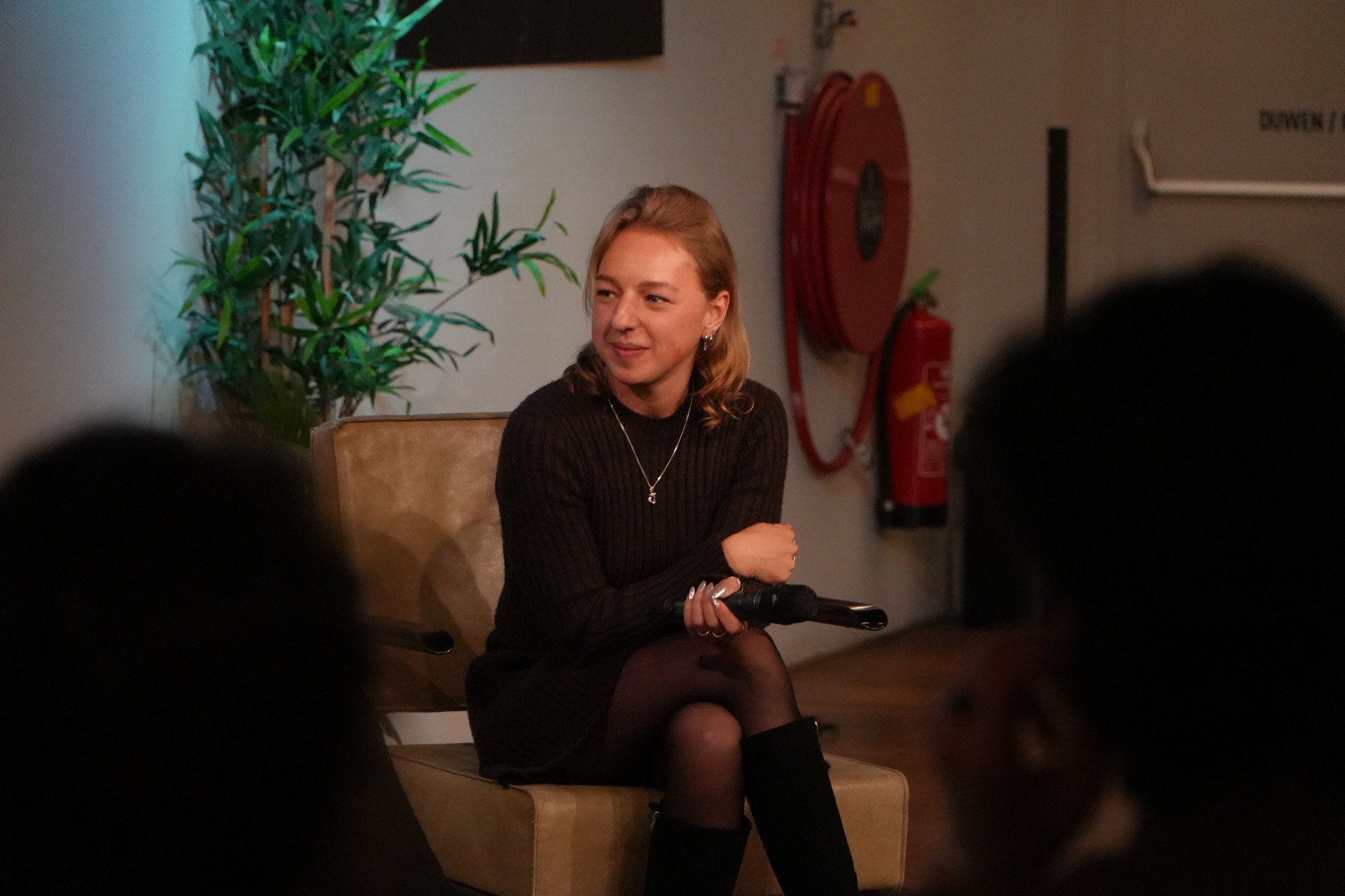 Stanzen speaking at an event